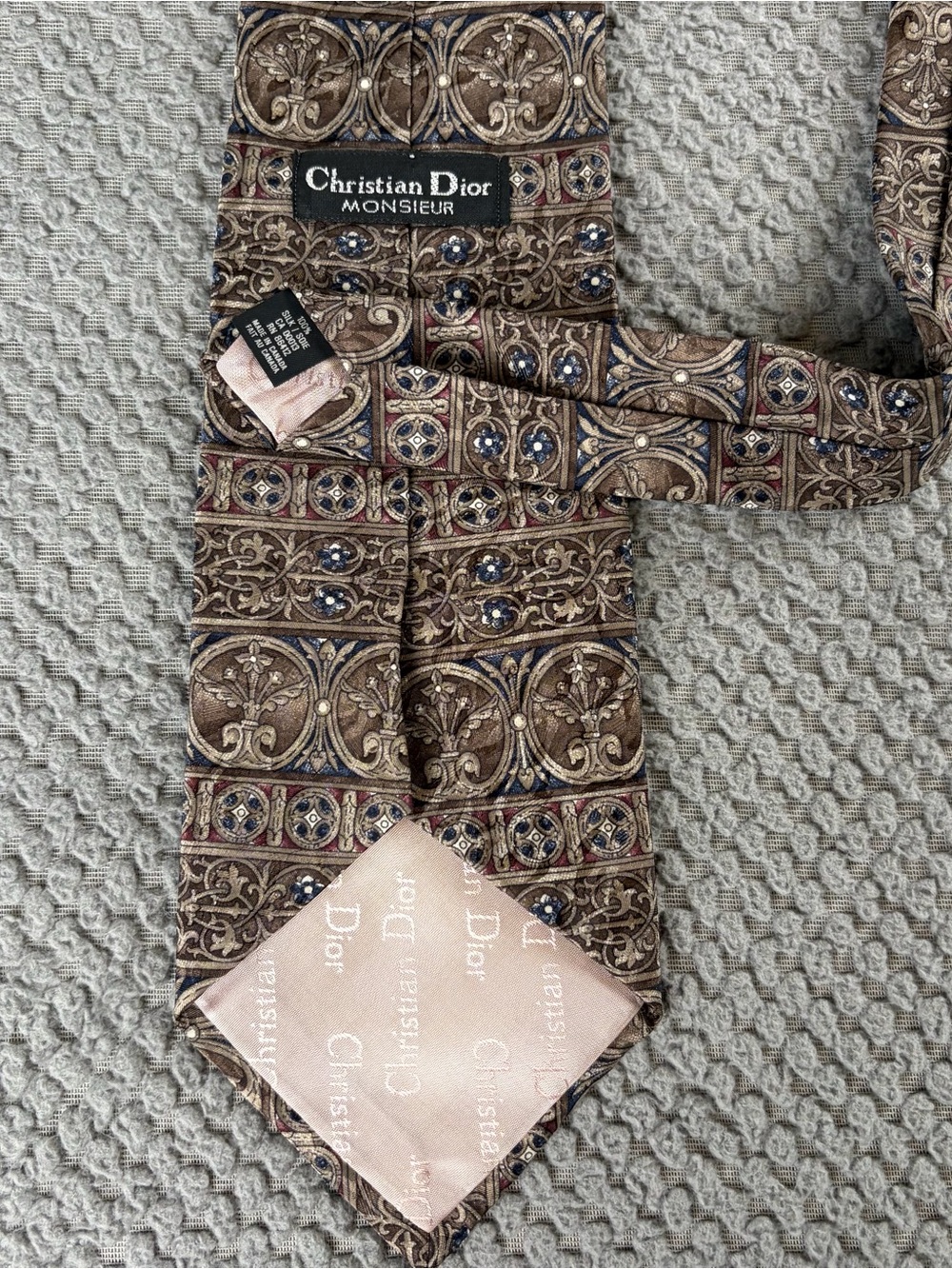 Dior Men's Brown Patterned Silk Tie with Blue and Red Accents